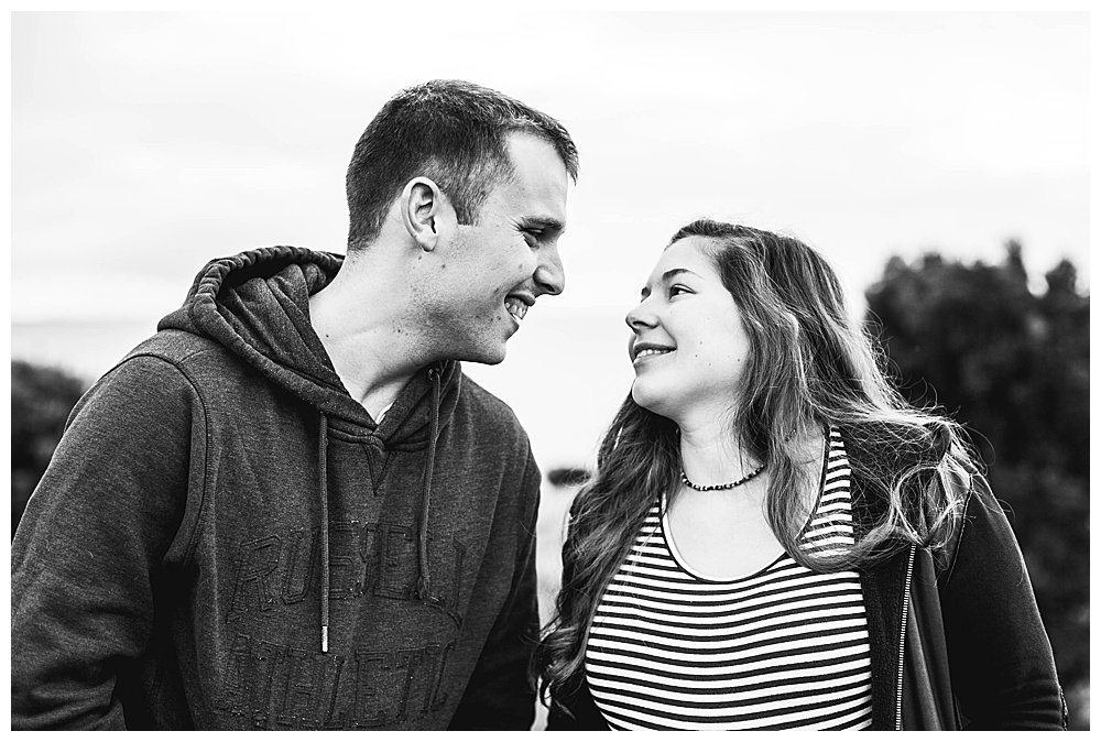 Tilly and Jared adoring each other on the beach.
