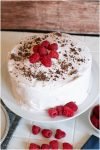 Easy chocolate cake filled with raspberries and whipped cream.